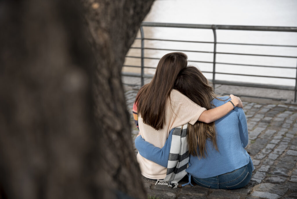 Supporting a struggling friend or family member involves encouraging open communication, being a caring and nonjudgmental presence, and assisting them in finding professional help if needed.